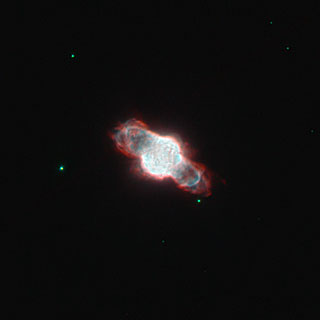Dying star cocooned within its own  
gases