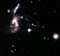 Hickson Compact Group 31: interacting galaxies glow with millions of ...